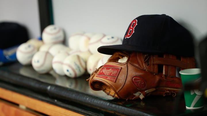 Jun 28, 2015; St. Petersburg, FL, USA; Boston Red Sox hat and glove lay in the dugout against the Tampa Bay Rays at Tropicana Field. Mandatory Credit: Kim Klement-USA TODAY Sports Jun 28, 2015; St. Petersburg, FL, USA; Boston Red Sox hat and glove lay in the dugout against the Tampa Bay Rays at Tropicana Field. Mandatory Credit: Kim Klement-USA TODAY Sports