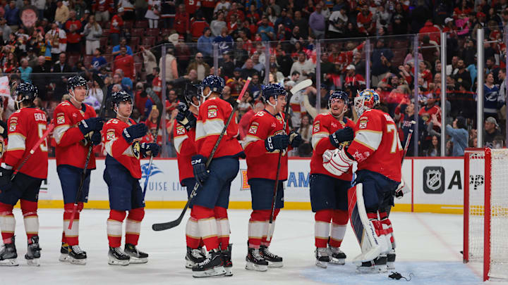 Mar 3, 2025; Sunrise, Florida, USA; Florida Panthers defenseman Nate Schmidt (88) celebrates with goaltender Sergei Bobrovsky (72) after the game against the Tampa Bay Lightning at Amerant Bank Arena. Mandatory Credit: Sam Navarro-Imagn Images