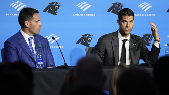 Feb 1, 2024; Charlotte, NC, USA; Carolina Panthers head coach Dave Canales speaks to the media as general manager Dan Morgan looks on during the introductory press conference at Bank of America Stadium. Mandatory Credit: Jim Dedmon-Imagn Images Feb 1, 2024; Charlotte, NC, USA; Carolina Panthers head coach Dave Canales speaks to the media as general manager Dan Morgan looks on during the introductory press conference at Bank of America Stadium. Mandatory Credit: Jim Dedmon-Imagn Images