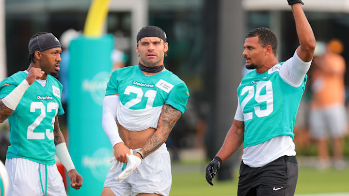 Miami Dolphins safety Minkah Fitzpatrick (right), safety Ashtyn Davis (center) and cornerback Jack Jones (left) work during training camp at Baptist Health Training Complex. Miami Dolphins safety Minkah Fitzpatrick (right), safety Ashtyn Davis (center) and cornerback Jack Jones (left) work during training camp at Baptist Health Training Complex.