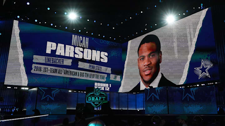 Penn State Nittany Lions wide receiver Micah Parsons is displayed on the video board after being selected as the 12th pick by the Dallas Cowboys during the 2021 NFL Draft at First Energy Stadium. Penn State Nittany Lions wide receiver Micah Parsons is displayed on the video board after being selected as the 12th pick by the Dallas Cowboys during the 2021 NFL Draft at First Energy Stadium.