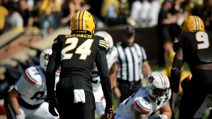 Oct 20, 2024; Columbia, Missouri, USA; Missouri Tigers cornerback Nicholas Deloach Jr. (24) prepares to drop back in coverage during a game against the Auburn Tigers at Faurot Field at Memorial Stadium.