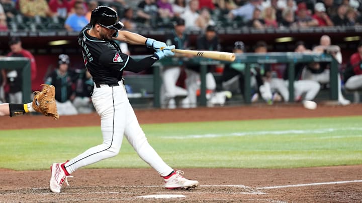 Jun 30, 2024; Phoenix, Arizona, USA; Arizona Diamondbacks pinch hitter Blaze Alexander (9) hits a two RBI single against the Oakland Athletics during the seventh inning at Chase Field. Mandatory Credit: Joe Camporeale-Imagn Images Jun 30, 2024; Phoenix, Arizona, USA; Arizona Diamondbacks pinch hitter Blaze Alexander (9) hits a two RBI single against the Oakland Athletics during the seventh inning at Chase Field. Mandatory Credit: Joe Camporeale-Imagn Images