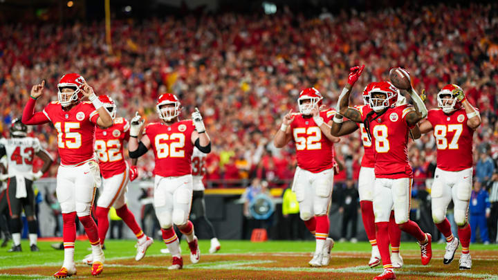 Nov 4, 2024; Kansas City, Missouri, USA; Kansas City Chiefs wide receiver DeAndre Hopkins (8) celebrates with teammates after scoring a touchdown during the first half against the Tampa Bay Buccaneers at GEHA Field at Arrowhead Stadium. Mandatory Credit: Jay Biggerstaff-Imagn Images