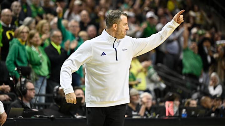Mar 7, 2026; Eugene, Oregon, USA; Washington Huskies head coach Danny Sprinkle is ejected after arguing a call with 2.5 seconds to go in the game against the Oregon Ducks at Matthew Knight Arena. Mandatory Credit: Craig Strobeck-Imagn Images