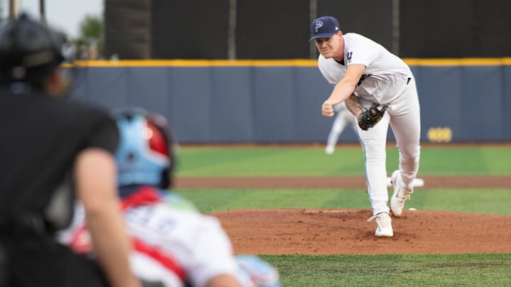 Starter Dax Fulton (18) throws the first pitch of the season during the Montgomery Biscuits vs Pensacola Blue Wahoos baseball game on opening night at Blue Wahoos Stadium in Pensacola, Fla., on April 7, 2023.