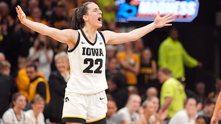 Iowa Hawkeyes guard Caitlin Clark (22) celebrates in the final seconds of a second-round NCAA Tournament game between Iowa and West Virginia, Monday, March 25, 2024 at Carver Hawkeye Arena in Iowa City.