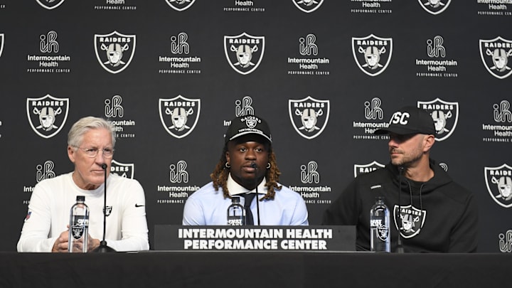 Apr 25, 2025; Henderson, NV, USA; (L-R) Las Vegas Raiders head coach Pete Carroll, Ashton Jeanty and general manager John Spytek during a news conference introducing Jeanty as the first round draft pick in the 2025 NFL Draft at Intermountain Health Performance Center. Mandatory Credit: Candice Ward-Imagn Images Apr 25, 2025; Henderson, NV, USA; (L-R) Las Vegas Raiders head coach Pete Carroll, Ashton Jeanty and general manager John Spytek during a news conference introducing Jeanty as the first round draft pick in the 2025 NFL Draft at Intermountain Health Performance Center. Mandatory Credit: Candice Ward-Imagn Images