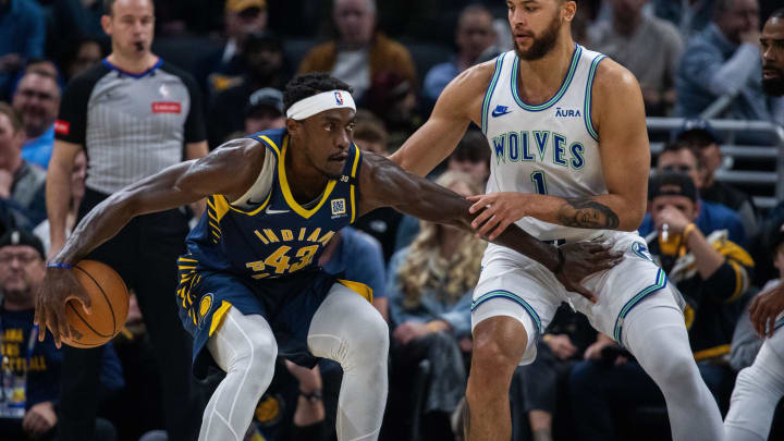 Mar 7, 2024; Indianapolis, Indiana, USA; Indiana Pacers forward Pascal Siakam (43) dribbles the ball while Minnesota Timberwolves forward Kyle Anderson (1) defends during the first half at Gainbridge Fieldhouse. Mandatory Credit: Trevor Ruszkowski-USA TODAY Sports