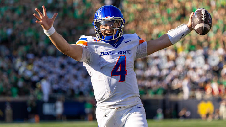 USA; Boise State Broncos quarterback Maddux Madsen (4) celebrates as he runs in a touchdown against the Notre Dame Fighting Irish during the first half at Notre Dame Stadium. Mandatory Credit: Michael Caterina-Imagn Images