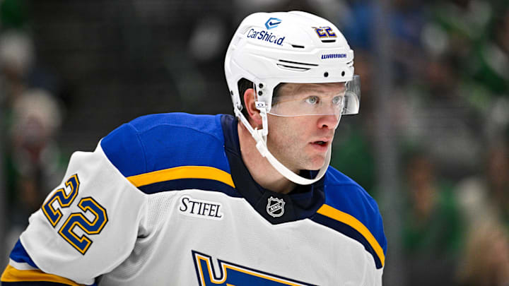 Dec 14, 2024; Dallas, Texas, USA; St. Louis Blues defenseman Ryan Suter (22) waits for the face-off against the Dallas Stars during the second period at American Airlines Center. Mandatory Credit: Jerome Miron-Imagn Images