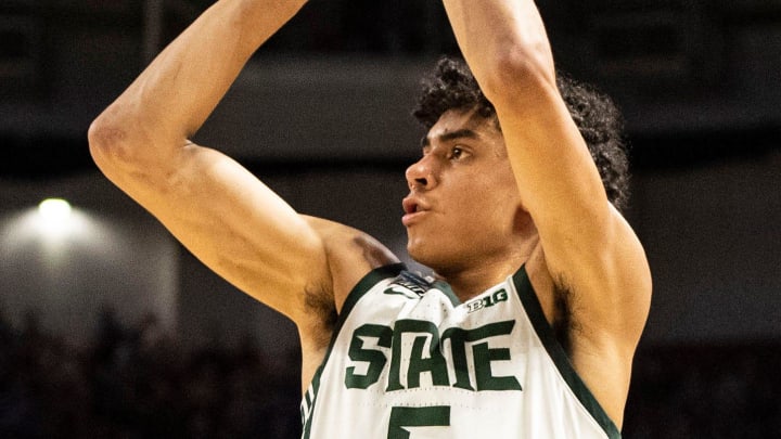 Michigan State's guard Max Christie (5) goes up for a shot against Davidson during the NCAA Div. 1 Men's Basketball Tournament preliminary round game at Bon Secours Wellness Arena in Greenville, S.C. Friday, March 18, 2022.

Jg Michdav 031822 004