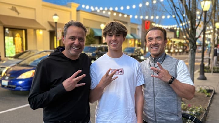 Jedd Fisch hosts New York quarterback recruit Grayer Hong. 