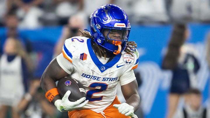 Dec 31, 2024; Glendale, AZ, USA; Boise State Broncos running back Ashton Jeanty (2) against the Penn State Nittany Lions during the Fiesta Bowl at State Farm Stadium. Mandatory Credit: Mark J. Rebilas-Imagn Images