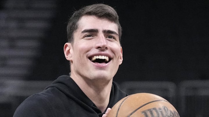 Mar 2, 2026; Milwaukee, Wisconsin, USA; Boston Celtics center Luka Garza (52) shoots during pregame warmups before a game against the Milwaukee Bucks at Fiserv Forum. Mandatory Credit: Michael McLoone-Imagn Images