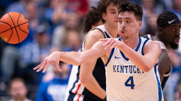 Kentucky forward Andrija Jelavic (4) makes a pass after a rebound against Gonzaga during their game at Bridgestone Arena in Nashville Friday, Dec. 5, 2025.