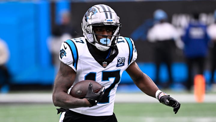 Dec 15, 2024; Charlotte, North Carolina, USA; Carolina Panthers wide receiver Xavier Legette (17) with the ball in the first quarter at Bank of America Stadium. Mandatory Credit: Bob Donnan-Imagn Images