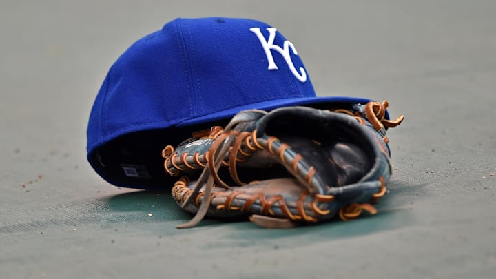 Apr 17, 2015; Kansas City, MO, USA; A general view of the hat and glove of Kansas City Royals first basemen Eric Hosmer the field prior to a game against the Oakland Athletics at Kauffman Stadium. Mandatory Credit: Peter G. Aiken-Imagn Images