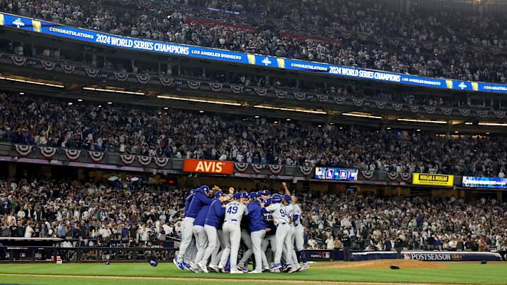 Oct 30, 2024; New York, New York, USA; Los Angeles Dodgers celebrate after winning the 2024 MLB World Series against the New York Yankees at Yankee Stadium. Mandatory Credit: Vincent Carchietta-Imagn Images