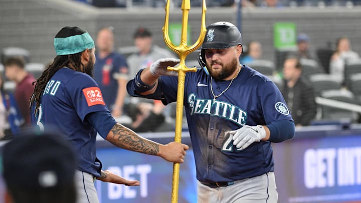 Seattle Mariners first baseman Rowdy Tellez (right) celebrates after hitting a grand slam against the Toronto Blue Jays on April 20 at Rogers Centre.