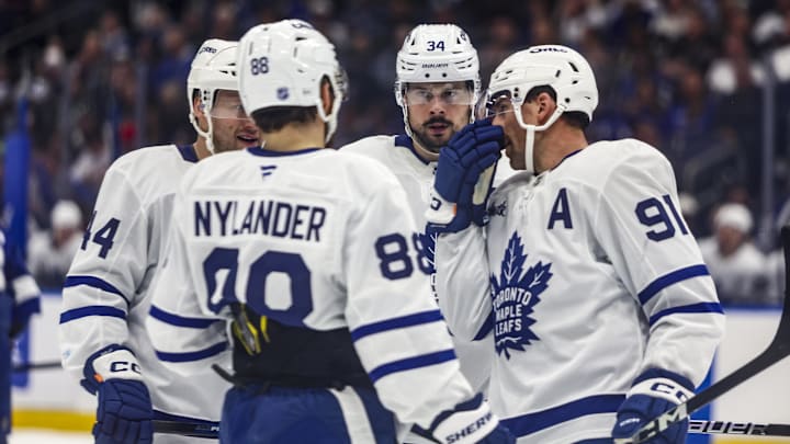 Feb 25, 2026; Tampa, Florida, USA; Toronto Maple Leafs forward Auston Matthews (34), defenseman Morgan Rielly (44), forward William Nylander (88), and forward John Tavares (91) huddle before a face-off against the Tampa Bay Lightning during the second period at Benchmark International Arena. Mandatory Credit: Morgan Tencza-Imagn Images Feb 25, 2026; Tampa, Florida, USA; Toronto Maple Leafs forward Auston Matthews (34), defenseman Morgan Rielly (44), forward William Nylander (88), and forward John Tavares (91) huddle before a face-off against the Tampa Bay Lightning during the second period at Benchmark International Arena. Mandatory Credit: Morgan Tencza-Imagn Images