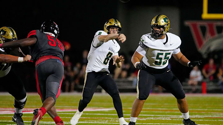 Basha quarterback throws a pass against Williams Field during a game at Williams Field High School in Gilbert, on Sept. 12, 2025. Basha quarterback throws a pass against Williams Field during a game at Williams Field High School in Gilbert, on Sept. 12, 2025.