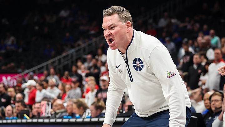Mar 14, 2025; Kansas City, MO, USA; Arizona Wildcats coach Tommy Lloyd reacts after a play Mar 14, 2025; Kansas City, MO, USA; Arizona Wildcats coach Tommy Lloyd reacts after a play