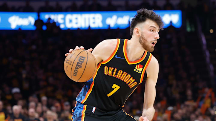 May 5, 2025; Oklahoma City, Oklahoma, USA; Oklahoma City Thunder forward Chet Holmgren (7) dribbles down the court against the Denver Nuggets during the second half during game one of the second round for the 2025 NBA Playoffs at Paycom Center. Mandatory Credit: Alonzo Adams-Imagn Images