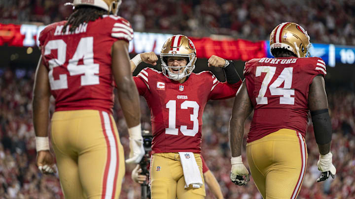 October 8, 2023; Santa Clara, California, USA; San Francisco 49ers quarterback Brock Purdy (13) celebrates with running back Jordan Mason (24) after a touchdown against the Dallas Cowboys during the fourth quarter at Levi's Stadium. Mandatory Credit: Kyle Terada-Imagn Images October 8, 2023; Santa Clara, California, USA; San Francisco 49ers quarterback Brock Purdy (13) celebrates with running back Jordan Mason (24) after a touchdown against the Dallas Cowboys during the fourth quarter at Levi's Stadium. Mandatory Credit: Kyle Terada-Imagn Images