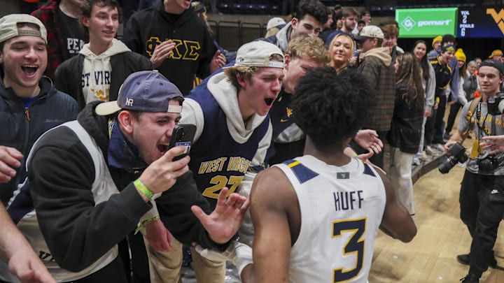 Jan 27, 2026; Morgantown, West Virginia, USA; West Virginia Mountaineers guard Honor Huff (3) celebrates with fans after defeating the Kansas State Wildcats at Hope Coliseum. Mandatory Credit: Ben Queen-Imagn Imagesa Jan 27, 2026; Morgantown, West Virginia, USA; West Virginia Mountaineers guard Honor Huff (3) celebrates with fans after defeating the Kansas State Wildcats at Hope Coliseum. Mandatory Credit: Ben Queen-Imagn Imagesa