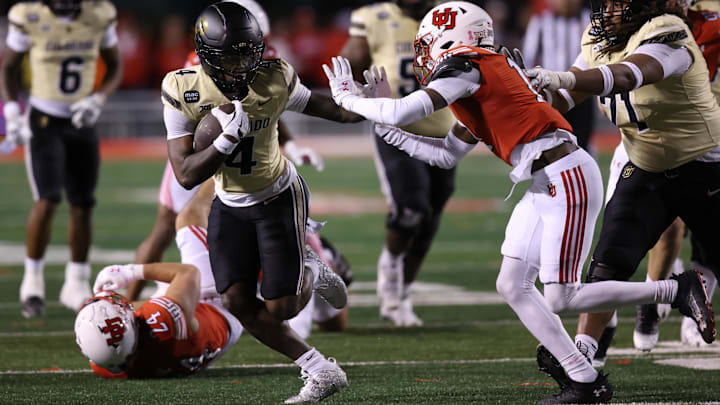 Oct 25, 2025; Salt Lake City, Utah, USA; Colorado Buffaloes wide receiver Omarion Miller (4) runs against Utah Utes defensive back Rock Caldwell (11) during the second half at Rice-Eccles Stadium. Mandatory Credit: Rob Gray-Imagn Images Oct 25, 2025; Salt Lake City, Utah, USA; Colorado Buffaloes wide receiver Omarion Miller (4) runs against Utah Utes defensive back Rock Caldwell (11) during the second half at Rice-Eccles Stadium. Mandatory Credit: Rob Gray-Imagn Images
