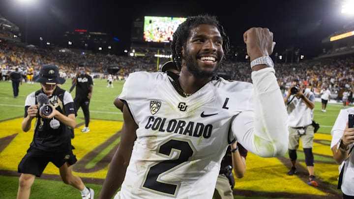 Oct 7, 2023; Tempe, Arizona, USA; Colorado Buffaloes quarterback Shedeur Sanders (2) celebrates after defeating the Arizona State Sun Devils at Mountain America Stadium, Home of the ASU Sun Devils. Mandatory Credit: Mark J. Rebilas-Imagn Images