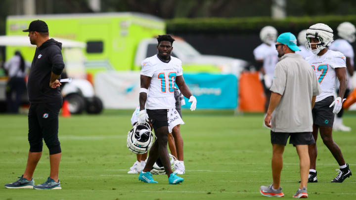 Jul 24, 2024; Miami Gardens, FL, USA; Miami Dolphins wide receiver Tyreek Hill (10) looks on during training camp at Baptist Health Training Complex. Mandatory Credit: Sam Navarro-USA TODAY Sports Jul 24, 2024; Miami Gardens, FL, USA; Miami Dolphins wide receiver Tyreek Hill (10) looks on during training camp at Baptist Health Training Complex. Mandatory Credit: Sam Navarro-USA TODAY Sports