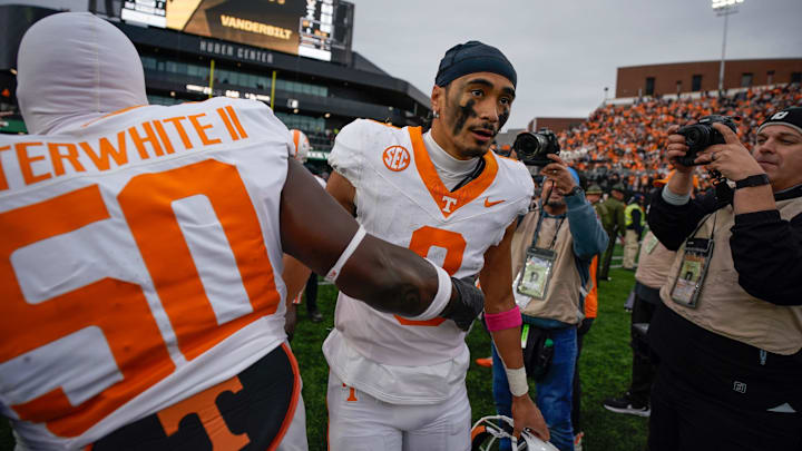 Tennessee quarterback Nico Iamaleava (8) celebrates with offensive lineman William Satterwhite (50) after the game at FirstBank Stadium in Nashville, Tenn., Saturday, Nov. 30, 2024.