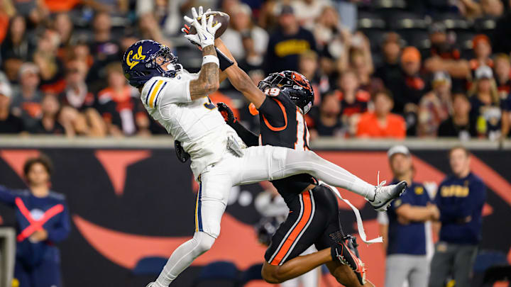 Aug 30, 2025; Corvallis, Oregon, USA; Oregon State Beavers defensive back Trey Glasper (19) defends a pass to California Golden Bears wide receiver Kyion Grayes (9) during the second half at Reser Stadium. Mandatory Credit: Craig Strobeck-Imagn Images