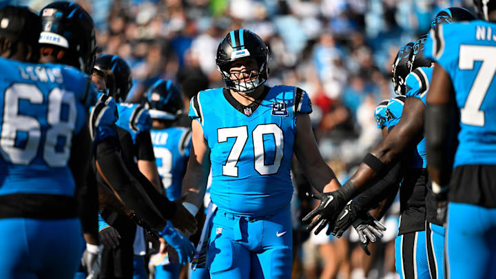 Oct 13, 2024; Charlotte, North Carolina, USA; Carolina Panthers guard Brady Christensen (70) is introduced before the game at Bank of America Stadium. Mandatory Credit: Bob Donnan-Imagn Images