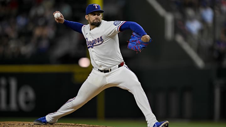 Aug 11, 2025; Arlington, Texas, USA; Texas Rangers starting pitcher Nathan Eovaldi (17) pitches during the game between the Texas Rangers and the Arizona Diamondbacks at Globe Life Field. 