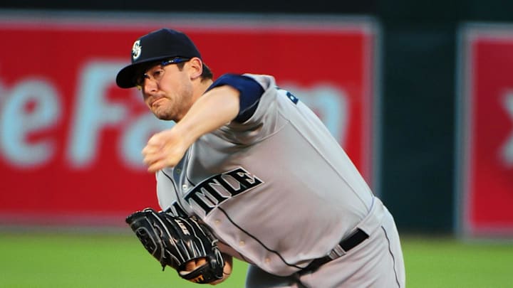 Seattle Mariners pitcher Ryan Rowland-Smith (18) delivers a pitch during the first inning against the Oakland Athletics at Oakland-Alameda County Coliseum. The Athletics defeated the Mariners 6-5 in 2010.