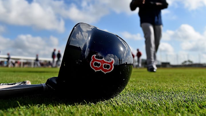 Feb 18, 2019; Lee County, FL, USA; A general view of a Boston Red Sox helmet as Boston Red Sox center fielder Jackie Bradley Jr. (19) walks on the field during a spring training workout at Jet Blue Park at Fenway South. Mandatory Credit: Jasen Vinlove-Imagn Images