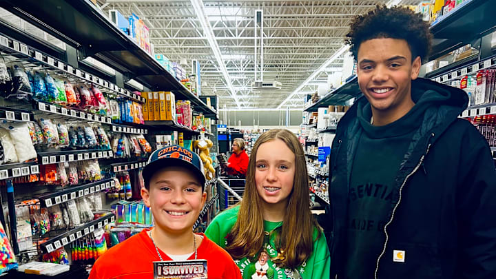 Nebraska football commit Trae Taylor spent time this week giving back to his community by buying Christmas presents for kids.