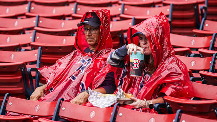 Aug 10, 2023; Boston, Massachusetts, USA; Boston Red Sox fans prepared for rain before the game against the Kansas City Royals at Fenway Park. Mandatory Credit: David Butler II-Imagn Images Aug 10, 2023; Boston, Massachusetts, USA; Boston Red Sox fans prepared for rain before the game against the Kansas City Royals at Fenway Park. Mandatory Credit: David Butler II-Imagn Images