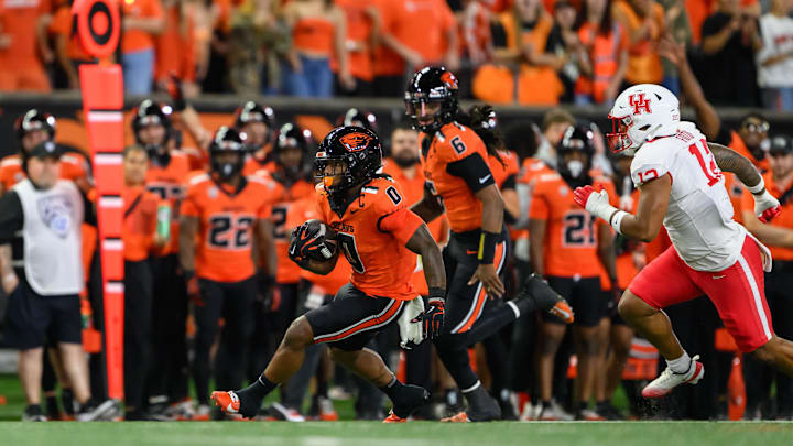 Oregon State Beavers running back Anthony Hankerson (0) runs the ball against the Houston Cougars during the first quarter.
