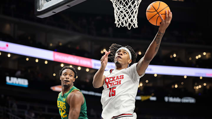 Mar 13, 2025; Kansas City, MO, USA; Texas Tech Red Raiders forward JT Toppin (15) shoots the ball during the first half against the Baylor Bears at T-Mobile Center. Mandatory Credit: William Purnell-Imagn Images