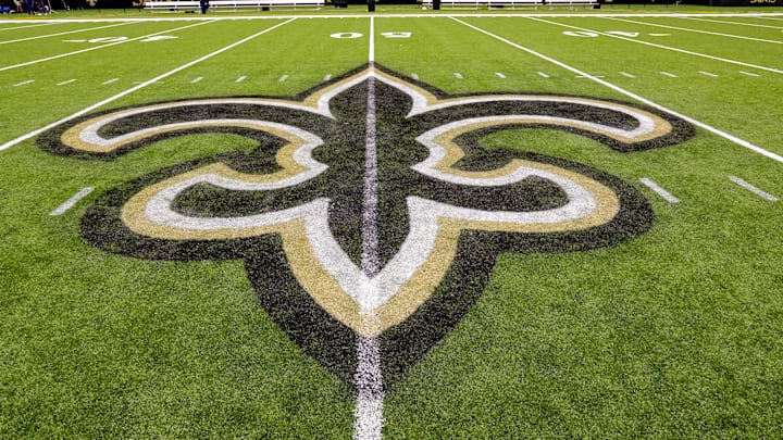 Oct 30, 2022; New Orleans, Louisiana, USA;  General view of the New Orleans Saints logo as the midfield logo fleur-de-lis after the game between the New Orleans Saints and the Las Vegas Raiders at Caesars Superdome. Mandatory Credit: Stephen Lew-Imagn Images