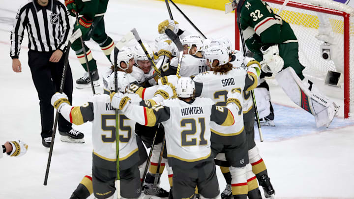 Apr 26, 2025; Saint Paul, Minnesota, USA; Vegas Golden Knights center Ivan Barbashev (49) celebrates with teammates after he puts the puck past Minnesota Wild goaltender Filip Gustavsson (32) during 1st OT in game four of the first round of the 2025 Stanley Cup Playoffs at Xcel Energy Center. Vegas Golden Knights win 4-3. Mandatory Credit: Bruce Fedyck-Imagn Images