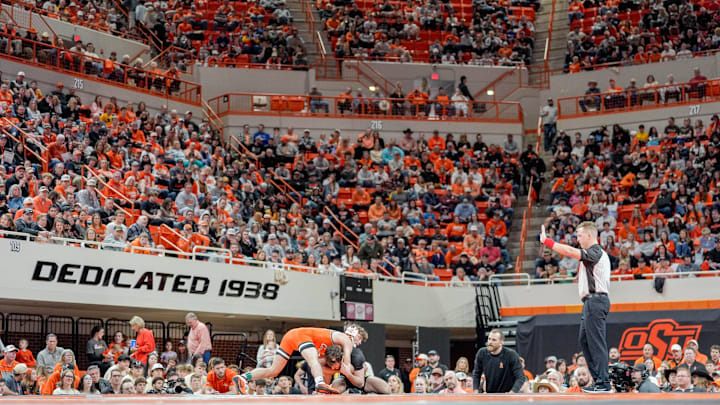 Oklahoma State’s Troy Spratley sprawls out after an attempted shot by Missouri’s Gage Walker during an NCAA wrestling meet between Oklahoma State and Missouri at Gallagher-Iba Arena in Stillwater, Okla., on Sunday, Feb. 2, 2025.