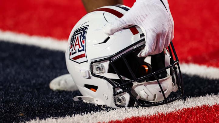 Oct 5, 2024; Tucson, Arizona, USA; Arizona Wildcats helmet gets picked before the game against the Texas Tech Red Raiders at Arizona Stadium. Mandatory Credit: Aryanna Frank-Imagn Images
