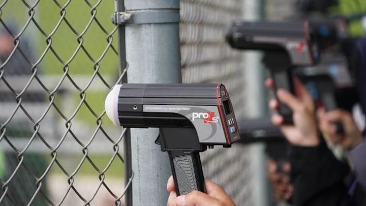 Scouts using Radar Guns to track pitch velocity