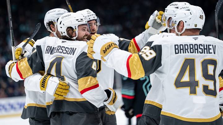 Apr 9, 2026; Seattle, Washington, USA; Vegas Golden Knights defenseman Rasmus Andersson (4) defenseman Noah Hanifin (15), third from left, forward Jack Eichel (9), second from right, and forward Ivan Barbashev (49) celebrate a goal during the first period against the Seattle Kraken at Climate Pledge Arena. Mandatory Credit: Stephen Brashear-Imagn Images