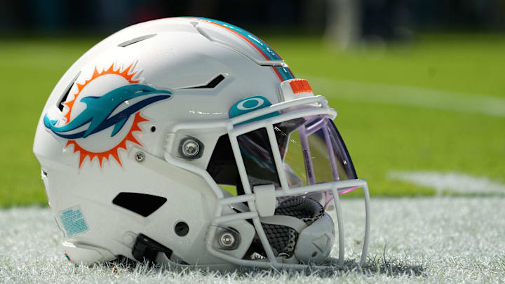 Nov 7, 2021; Miami Gardens, Florida, USA; A general view of a Miami Dolphins helmet on the field prior to the game between the Miami Dolphins and the Houston Texans at Hard Rock Stadium. Mandatory Credit: Jasen Vinlove-Imagn Images Nov 7, 2021; Miami Gardens, Florida, USA; A general view of a Miami Dolphins helmet on the field prior to the game between the Miami Dolphins and the Houston Texans at Hard Rock Stadium. Mandatory Credit: Jasen Vinlove-Imagn Images